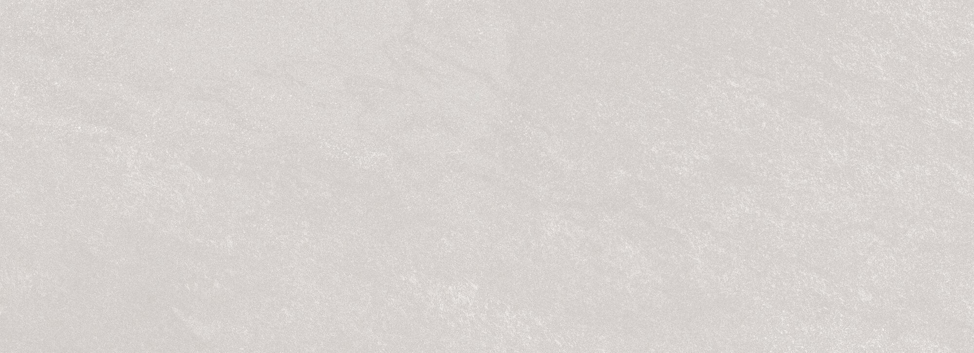 Reserve Silver 32x90cm ceramic wall tile displaying a soft, stone-inspired silver tone.