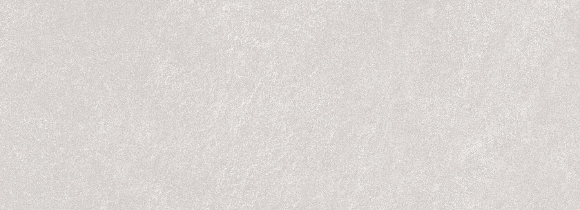 Reserve Silver 32x90 ceramic wall tile showcasing a soft, stone-inspired silver tone for contemporary interiors.