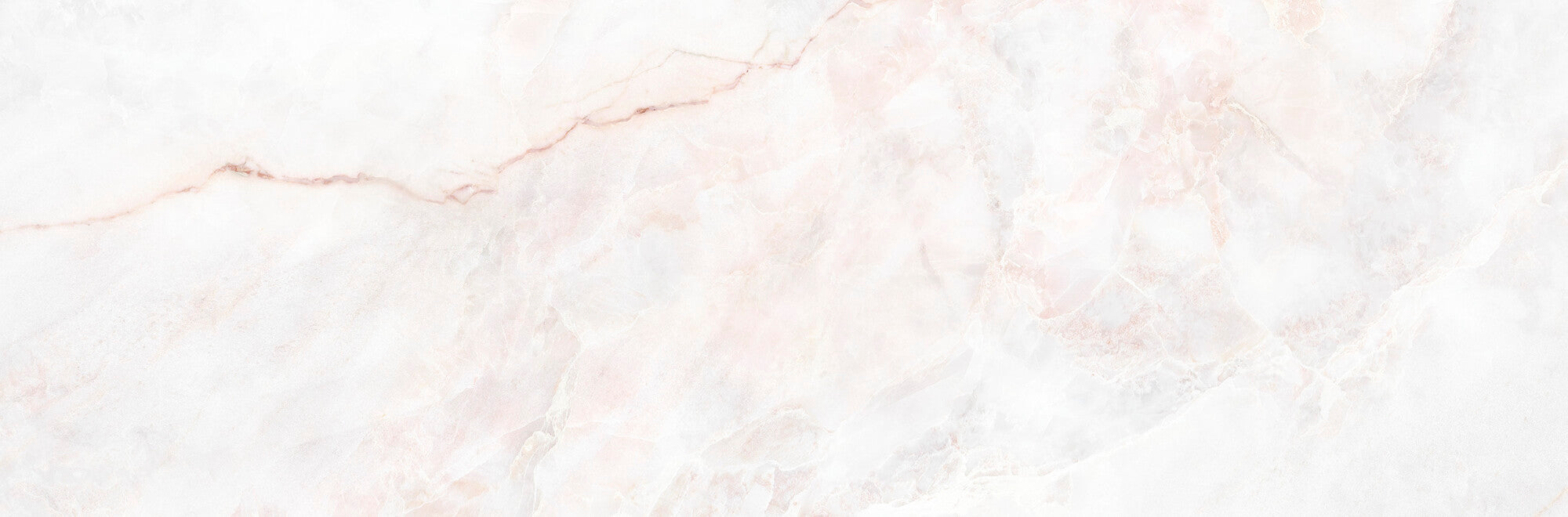 Lia White 33.3x100cm ceramic wall tile with soft white canvas and delicate pinkish veining.