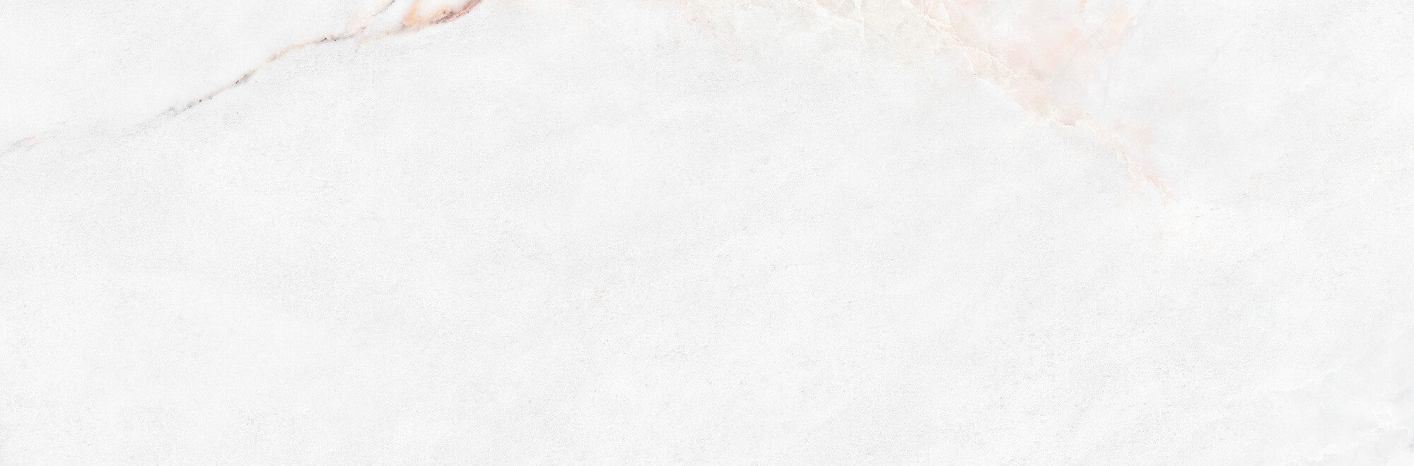 Lia White 33.3x100cm ceramic wall tile featuring a soft white surface with delicate pinkish veining.