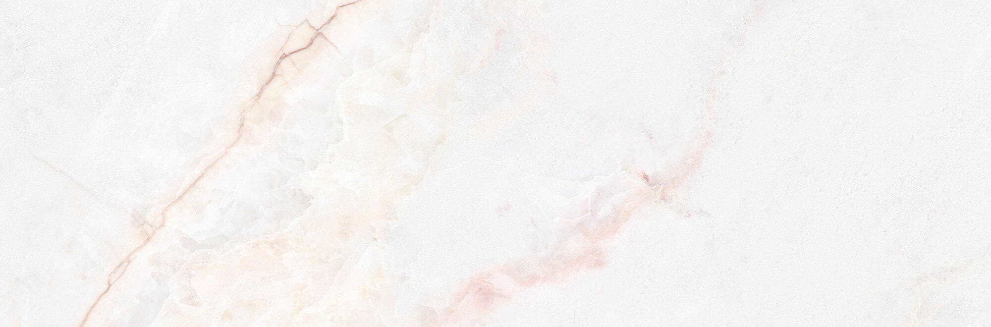 Lia White 33.3x100cm ceramic wall tile with soft white surface and delicate pinkish veining.
