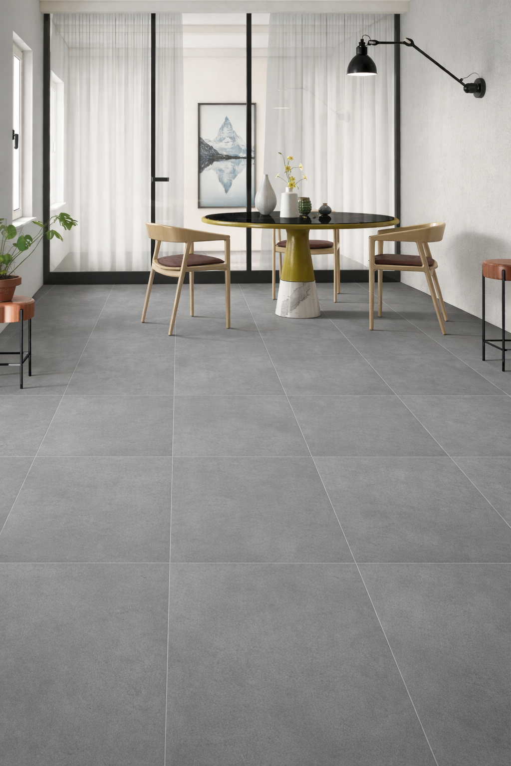 Modern interior featuring Raw Steel tiles, showcasing a sleek mid-grey finish and contemporary design.