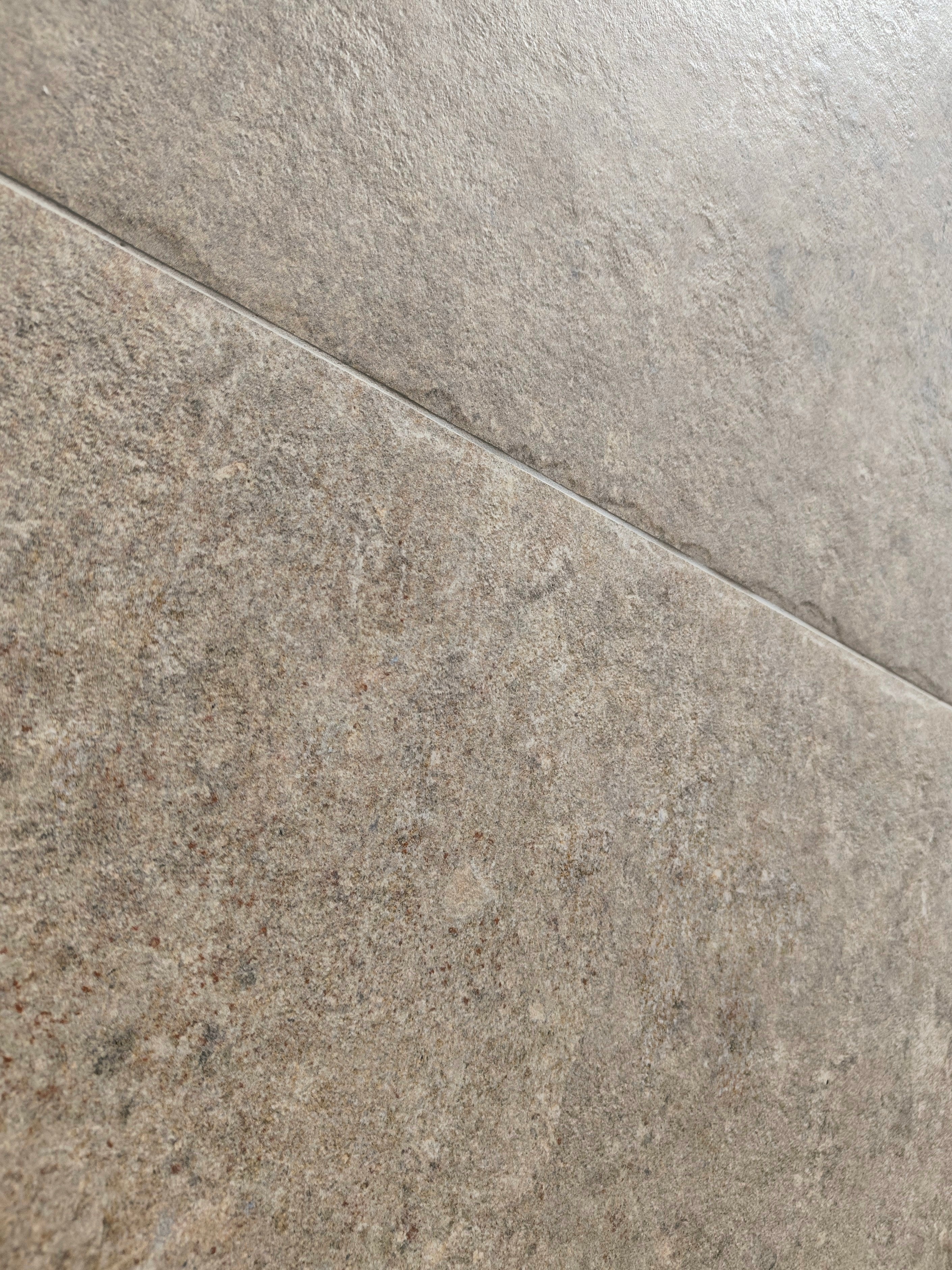 Lore taupe 60x90cm porcelain tile showcasing organic texture and layered tones.