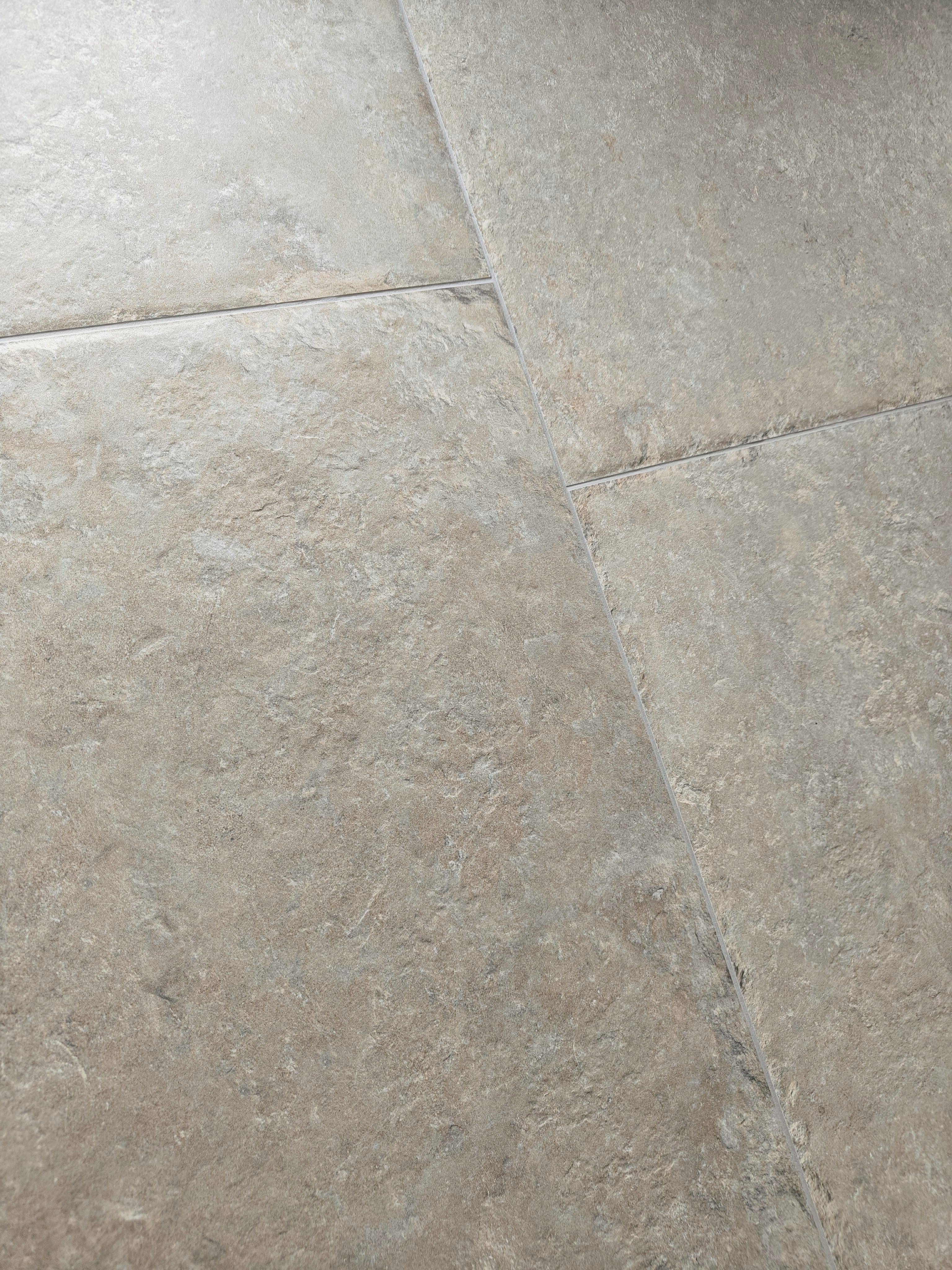 Castleton Taupe 60x90cm porcelain flooring showcasing warm taupe tones and natural stone finish.