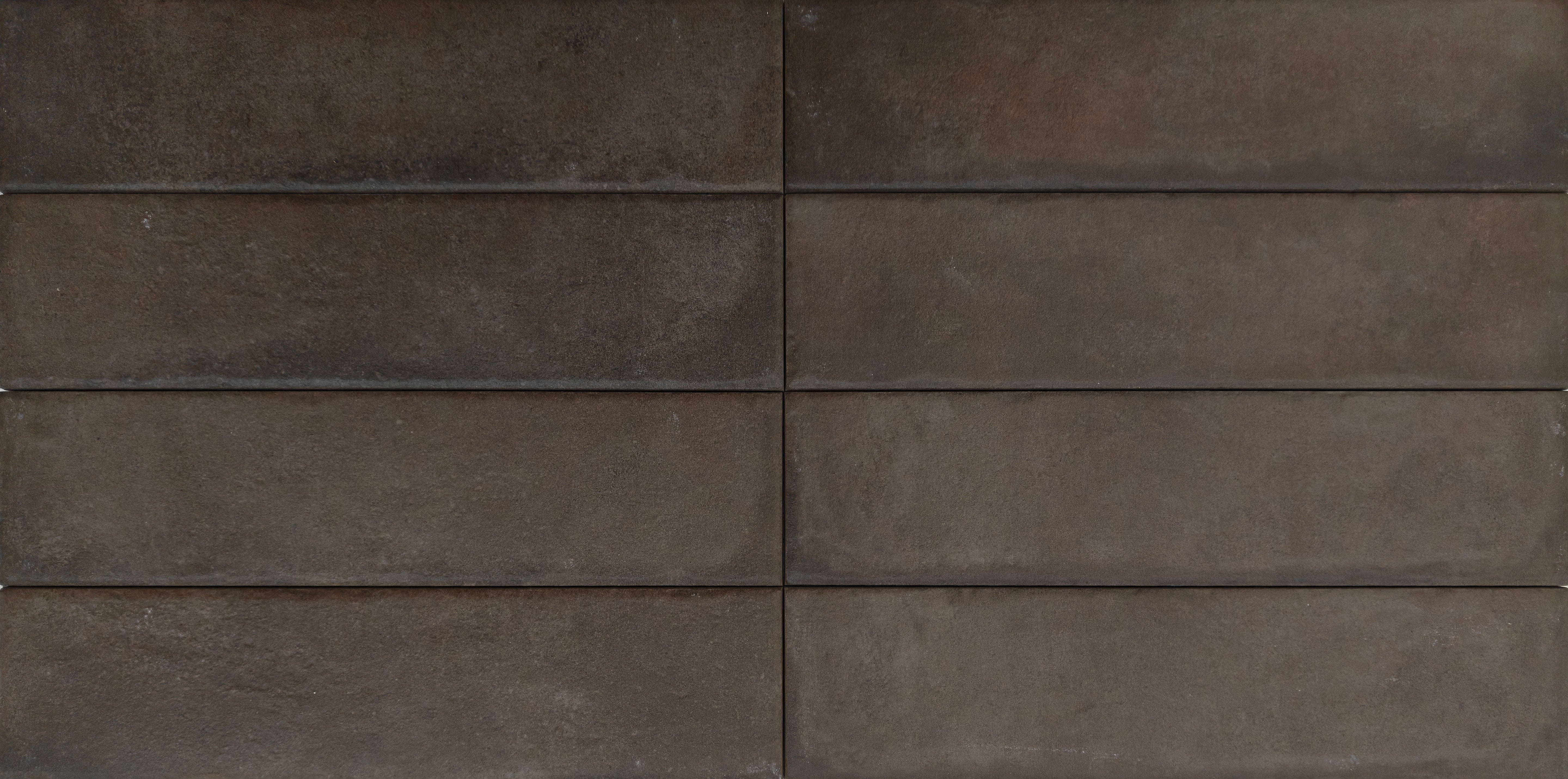 Rewind Tobacco 7x28cm tile showcasing deep smoky tones and a textured surface, perfect for a stylish, industrial look.