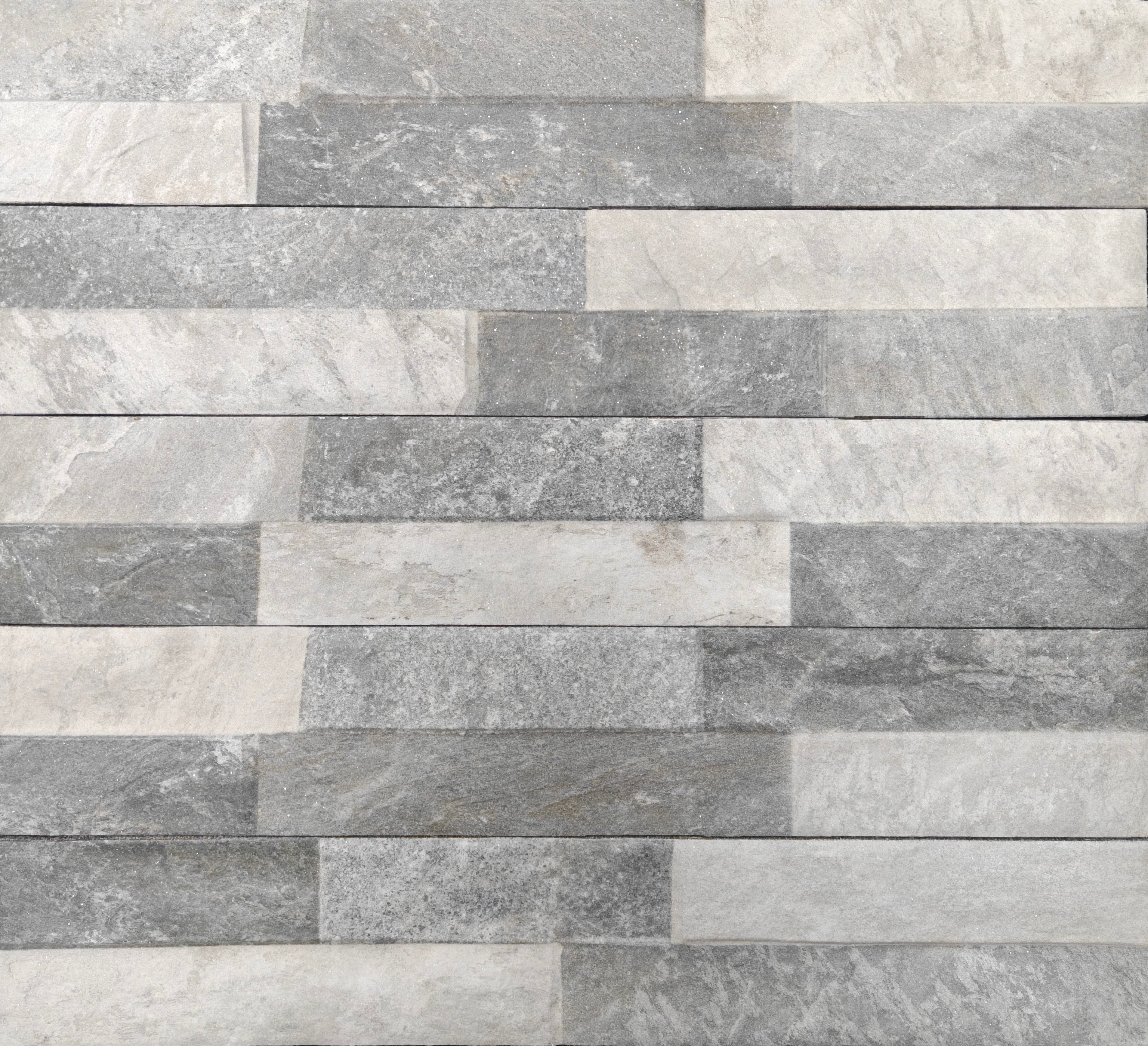 Ordino Grey 8x44.2cm porcelain tile showcasing a layered mix of soft greys and natural stone variation.