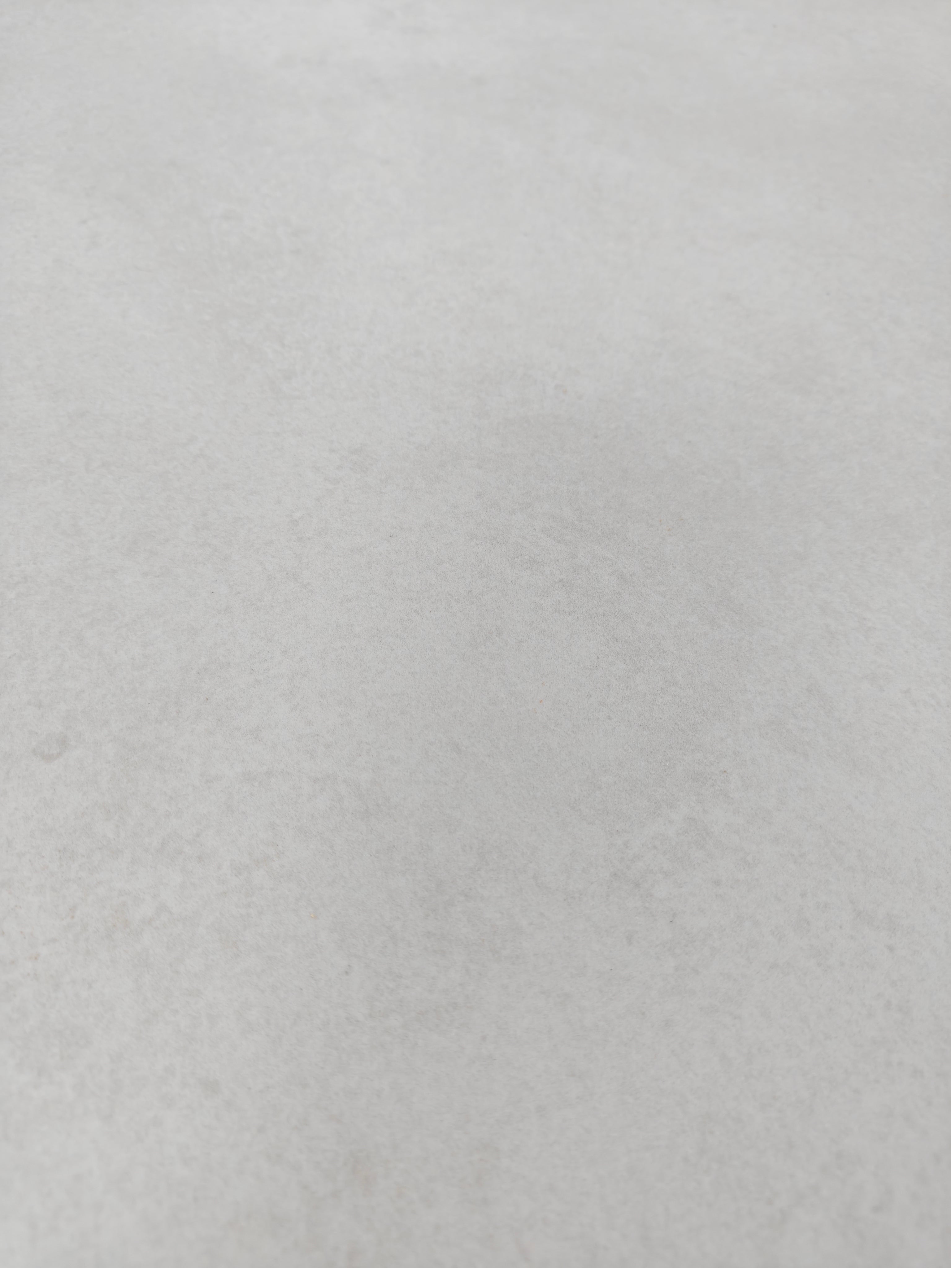 Raw Bianco surface showcasing its soft, light tone and organic texture in 60x60cm format.