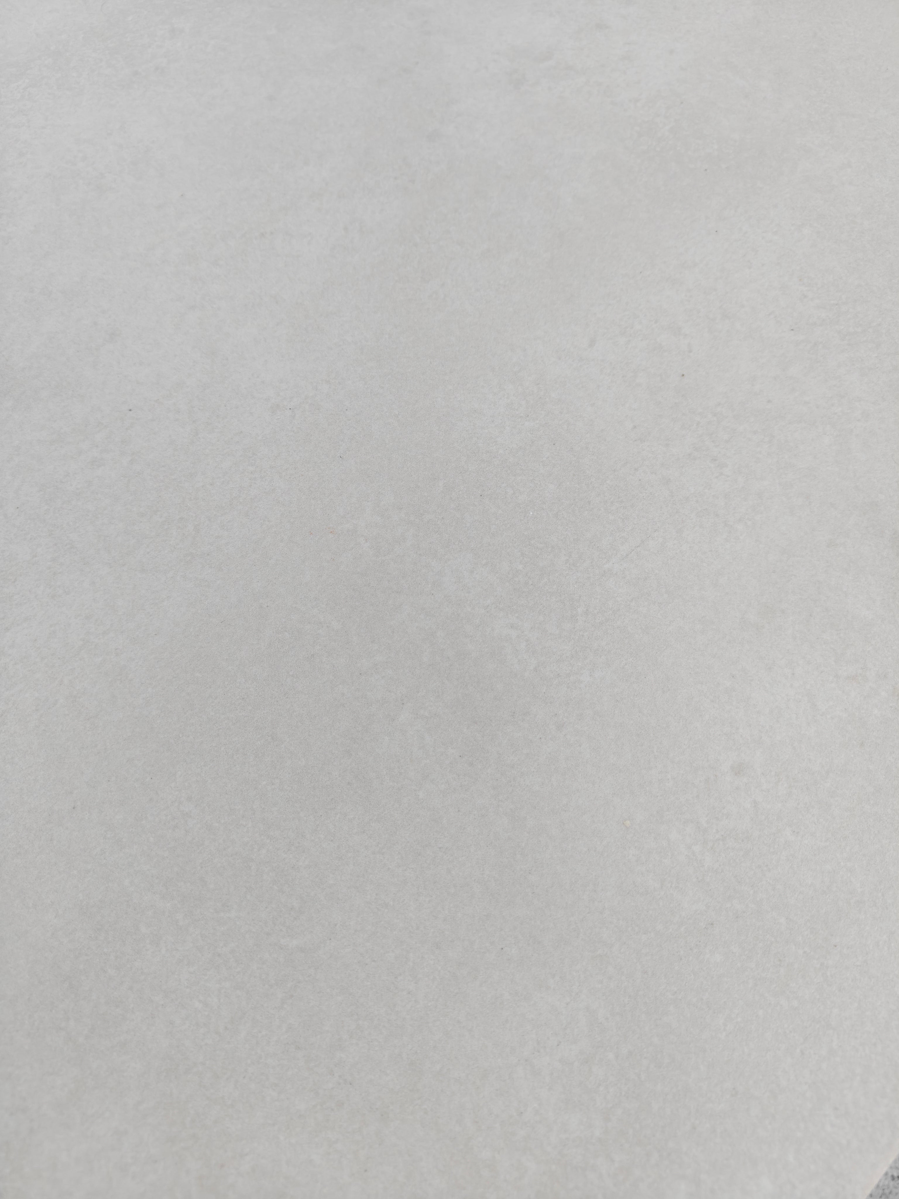Raw Bianco 60x60cm tile surface showcasing a soft, light tone and gently weathered character.