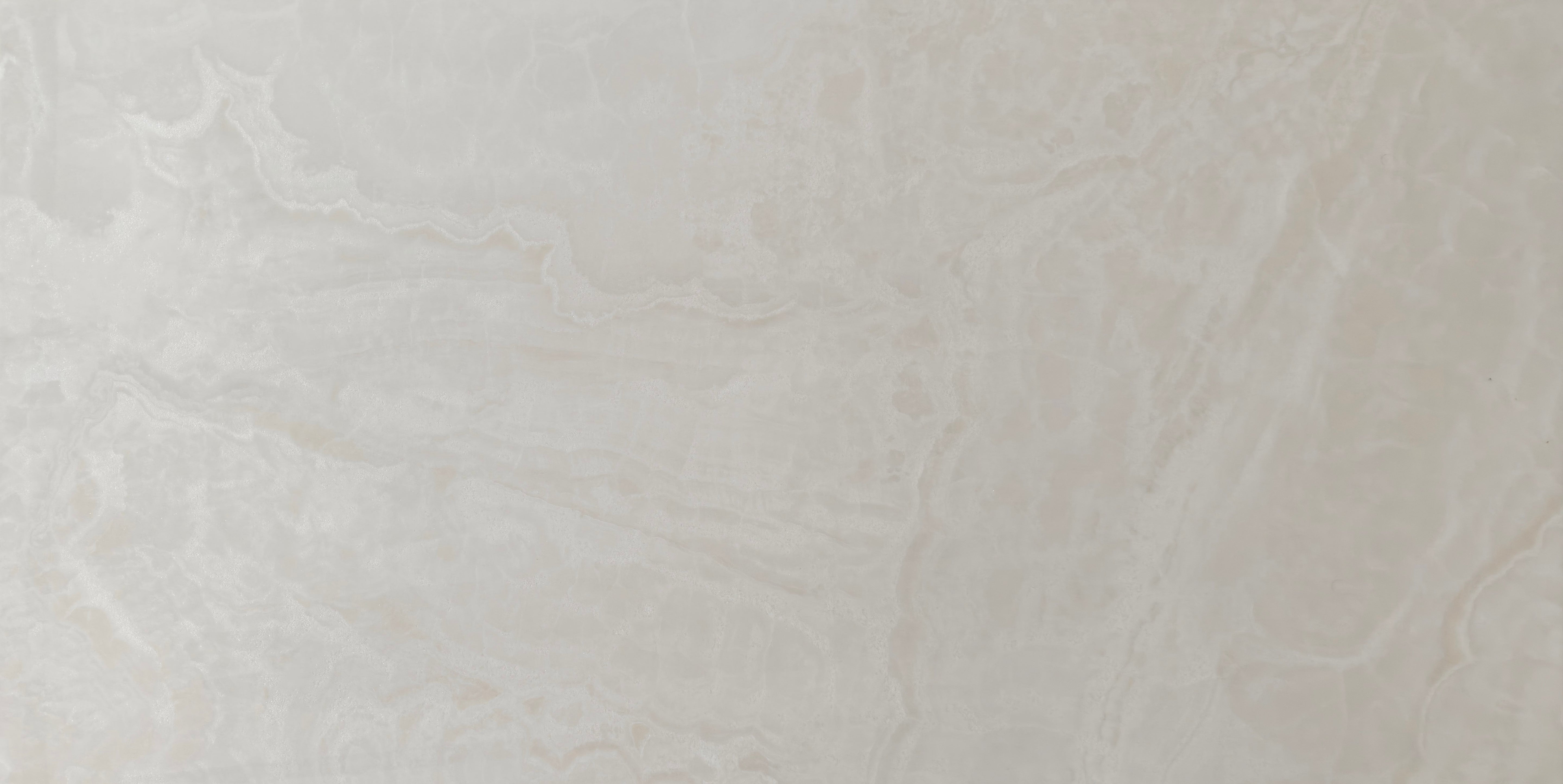 Sand Spark 60x120cm porcelain tile featuring soft ivory surface and warm sandy veining.