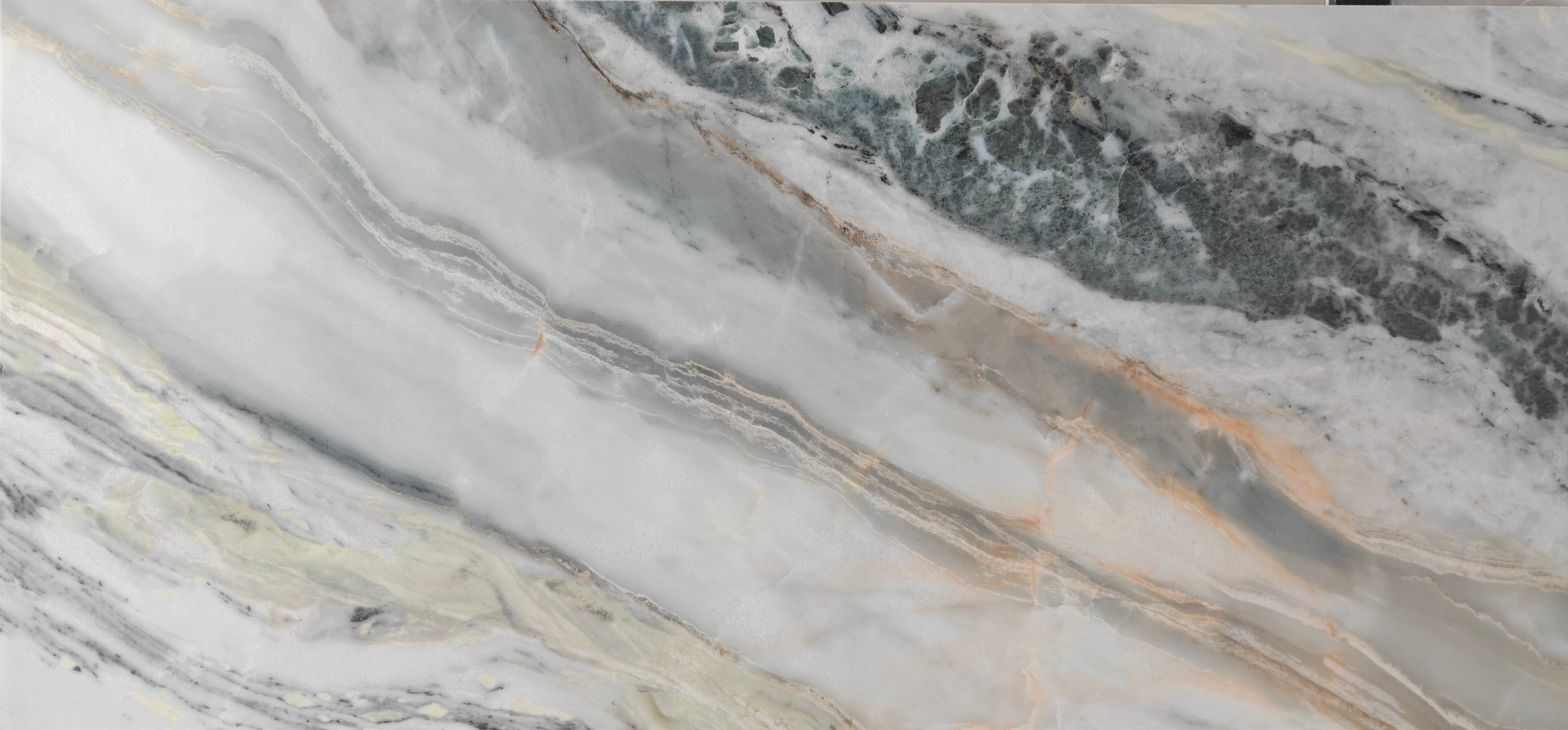 Jade Spark porcelain tile featuring flowing veining and polished surface, ideal for modern interiors.