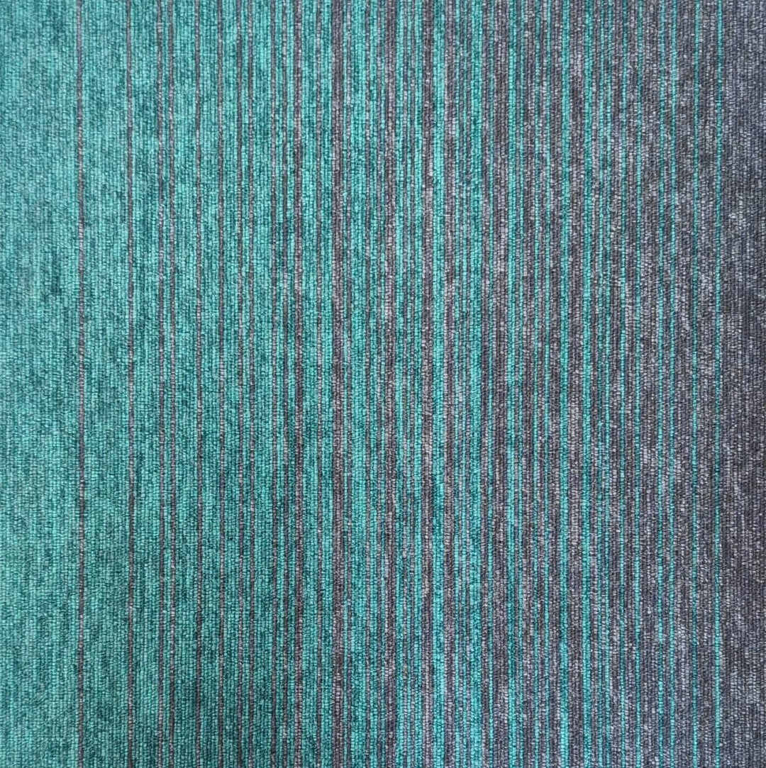 Burmatex Tivoli Mist Ocean Drive Carpet Tile design with teal and grey stripes.