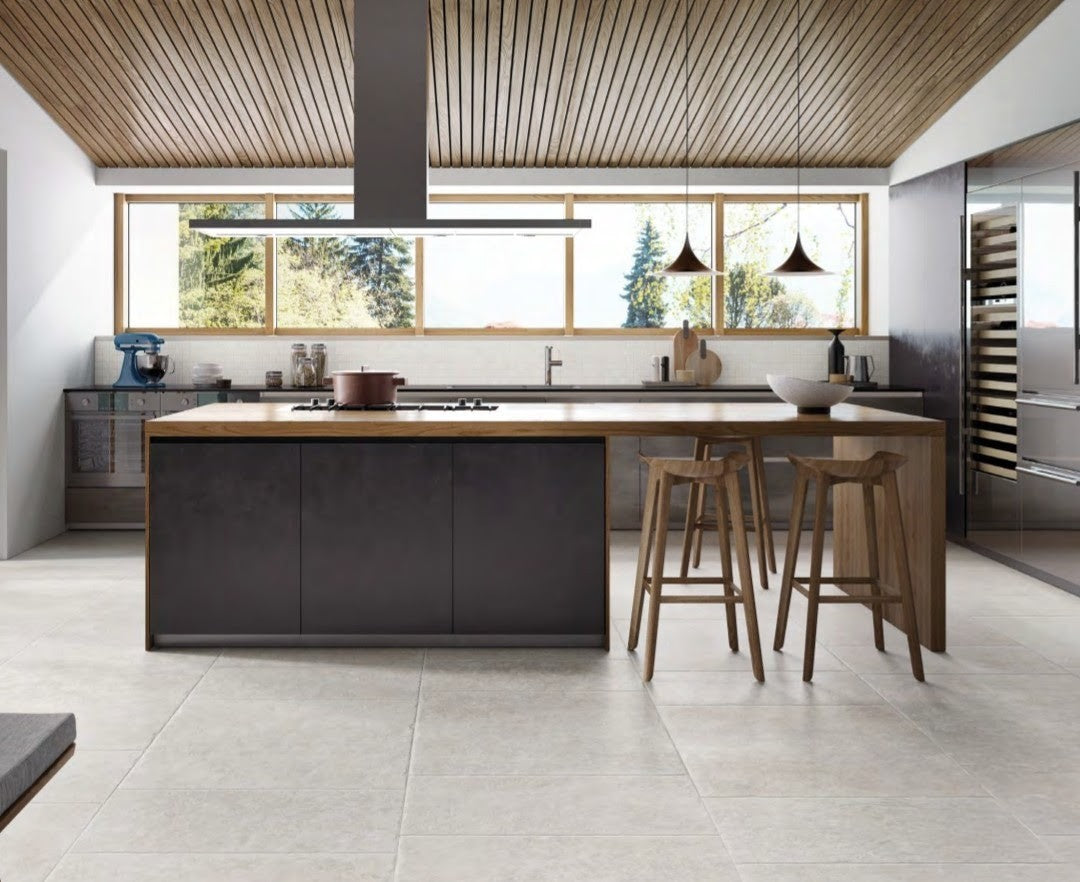 Chateau Blanco 80x80cm tile in a modern kitchen with wooden accents and sleek appliances.