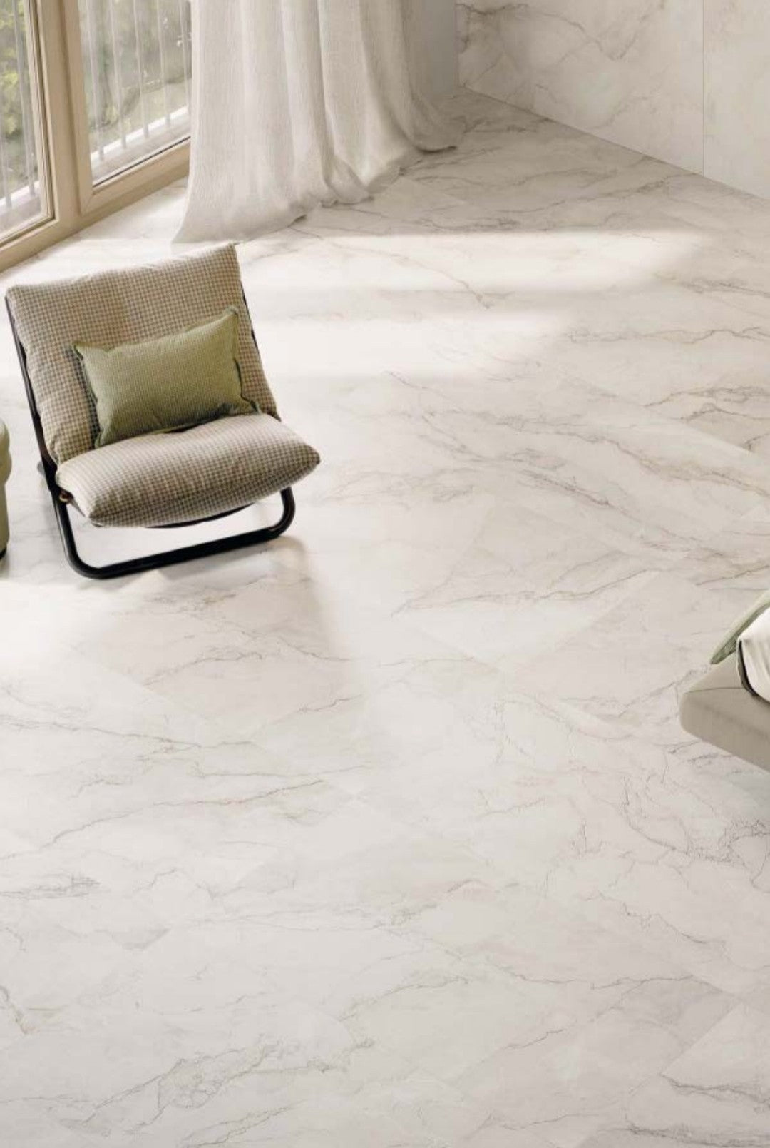 Bolgheri Stone White 60x120cm porcelain tile flooring with a modern chair and soft light.