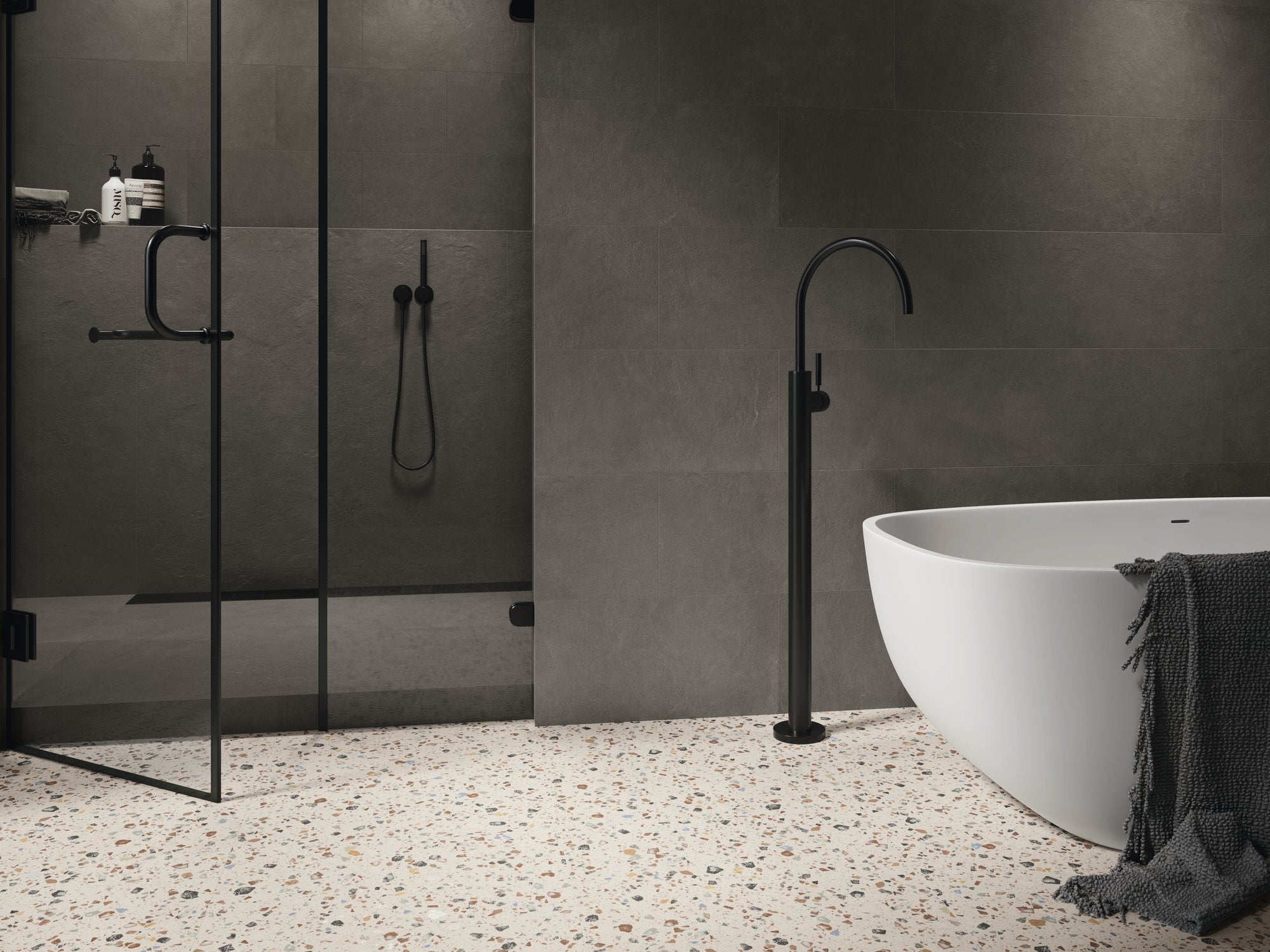 Coccio Terrazzo 60x60cm - £41.99 per M² elegantly displayed in a modern bathroom setting.